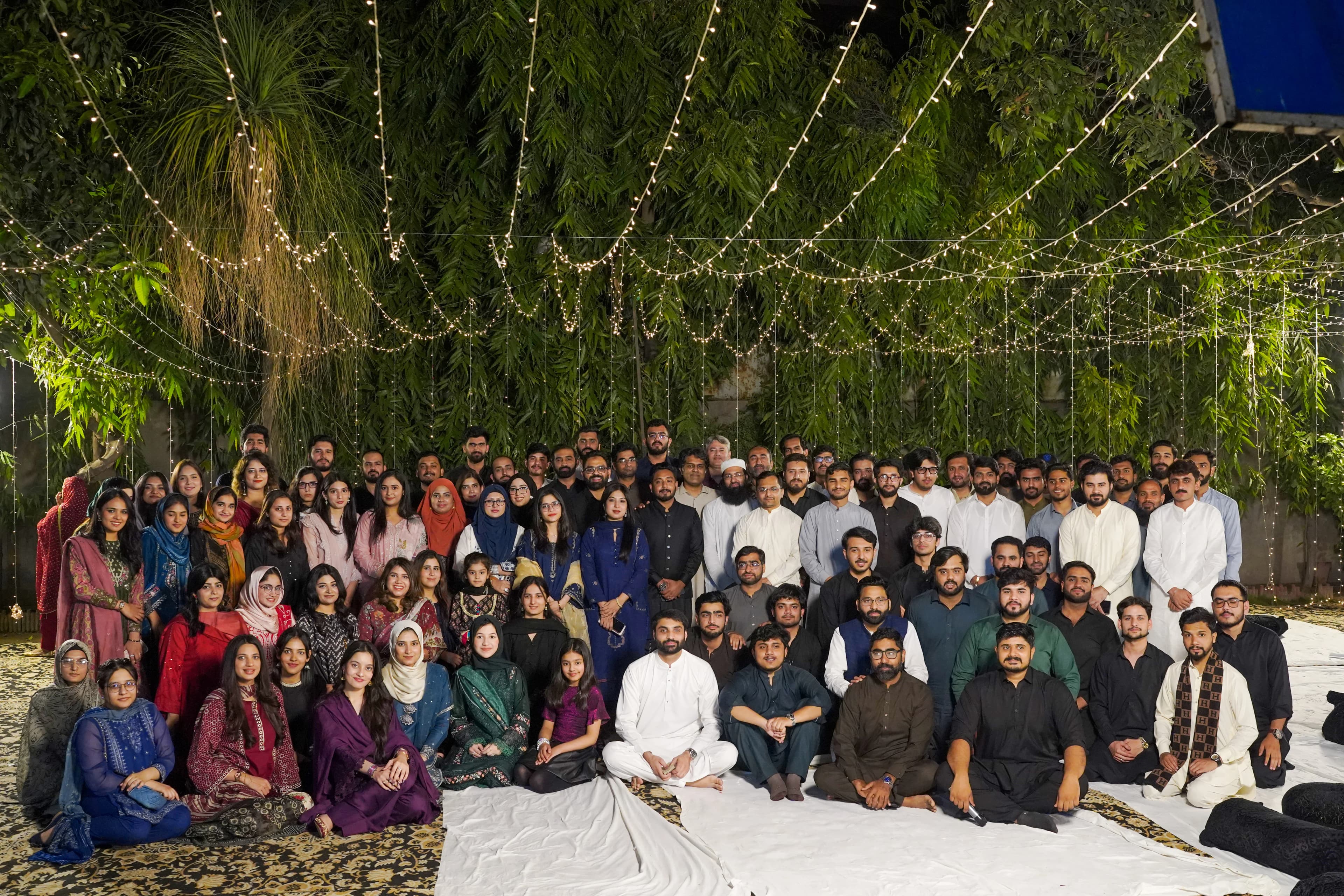 Clustox team group photo at a company evening event